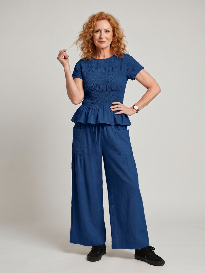 Eirenne | Peplum Detail Smocked Top And Wide Leg Pants Set