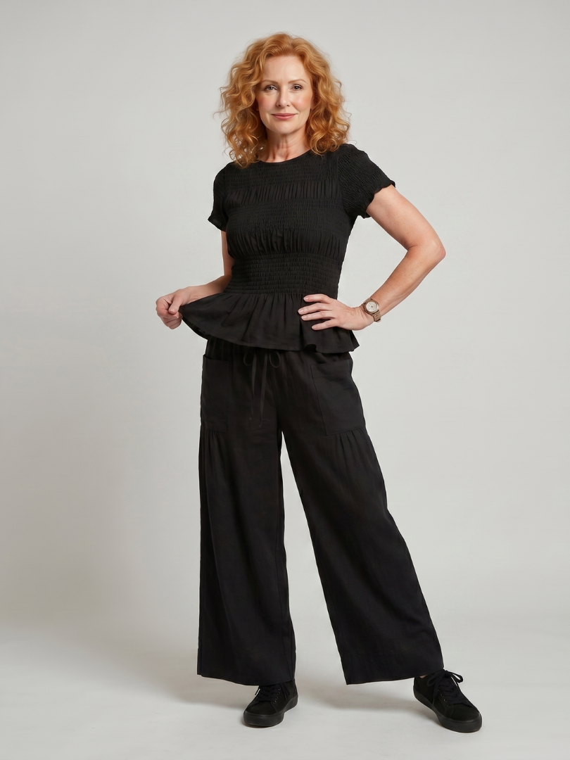 Eirenne | Peplum Detail Smocked Top And Wide Leg Pants Set